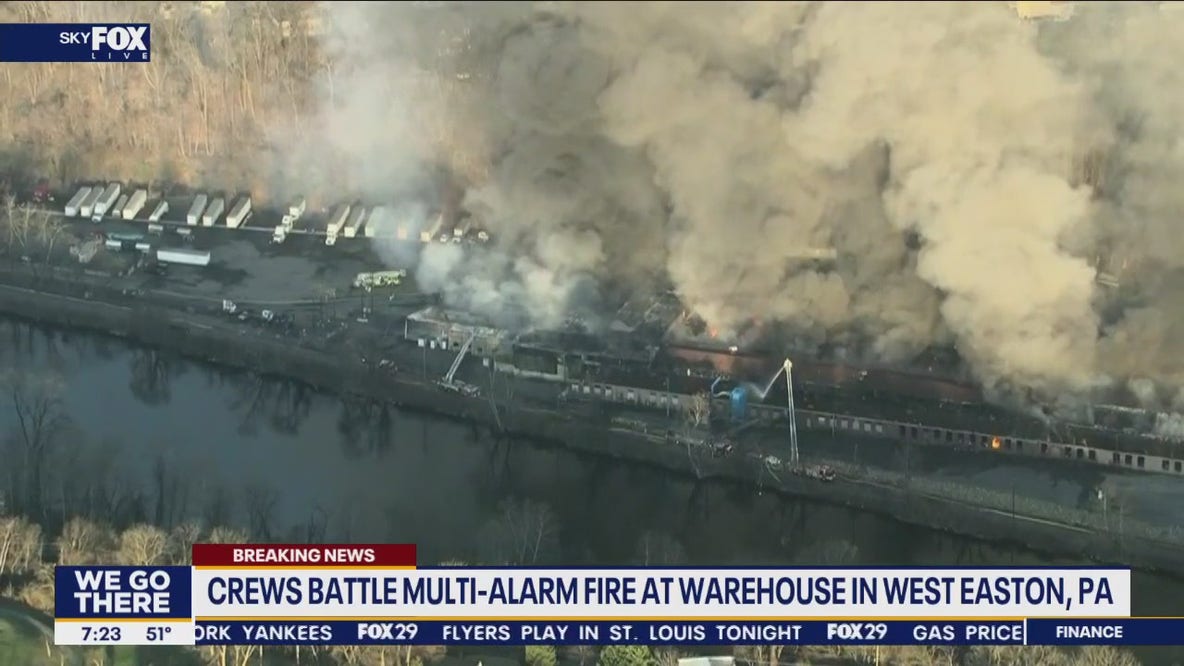 Crews battle multi-alarm fire at warehouse in West Easton